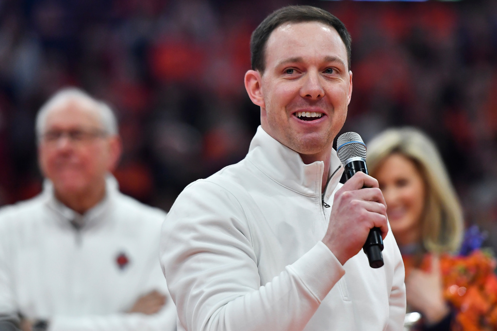 FILE - Syracuse assistant coach Gerry McNamara, now head coach at Siena, gives remarks at his jersey retirement ceremony after an NCAA college basketball game against Wake Forest in Syracuse, N.Y., Saturday, March 4, 2023. (AP Photo/Adrian Kraus, File)