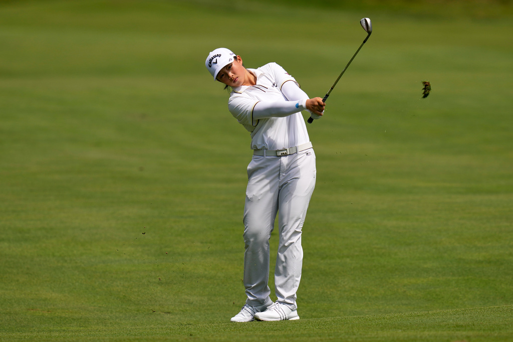 Ruoning Yin, of China, hits on the 12th fairway during the first round of the LPGA FM Championship golf tournament in Norton, Mass., Thursday, Aug. 27, 2026. (AP Photo/Charles Krupa)