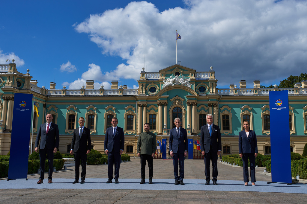 From left, Latvia's Prime Minister Andris Kulbergs, Finland's President Alexander Stubb, Estonia's Prime Minister Kristen Michal, Ukraine's President Volodymyr Zelenskyy, Norway's Prime Minister Jonas Gahr Store, Lithuania's President Gitanas Nauseda and Danish Prime Minister Mette Frederiksen pose for a group photo during a Ukrainian and Nordic-Baltic countries summit in Kyiv, Sunday, Aug. 23, 2026. (AP Photo/Francisco Seco) CORRECTION: ID corrected to Finland's President Alexander Stubb, instead of Finland's Prime Minister Petteri Orpo