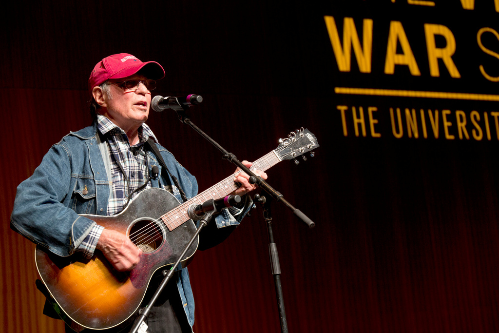 Singer-songwriter Country Joe McDonald performs at the Vietnam War Summit at the LBJ Presidential Library, in Austin, Texas, Thursday, April 28, 2016. (AP Photo/Nick Ut, File)