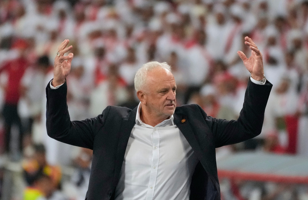 Iraqi's head coach Graham Arnold celebrates his team's win during the 2026 World Cup play off second leg soccer match between UAE and Iraq, in Basra, Iraq, Nov. 18, 2025. (AP Photo/Hadi Mizban)