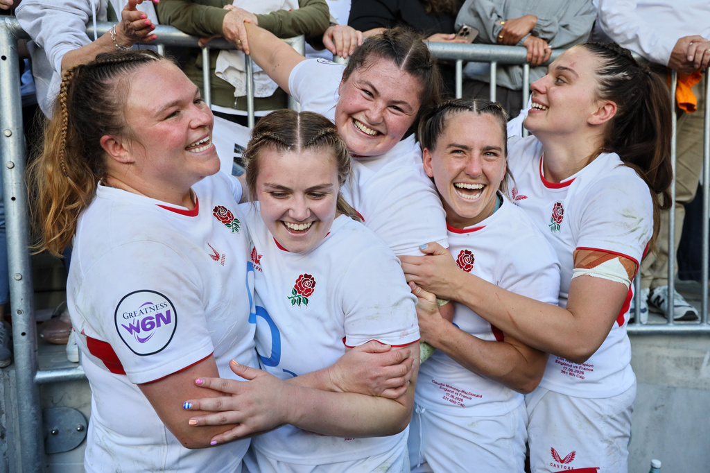 England players celebrate after winning the Six Nations rugby union match between France and England in Bordeaux, Sunday, May 17, 2026. (AP Photo/Yohan Bonnet)