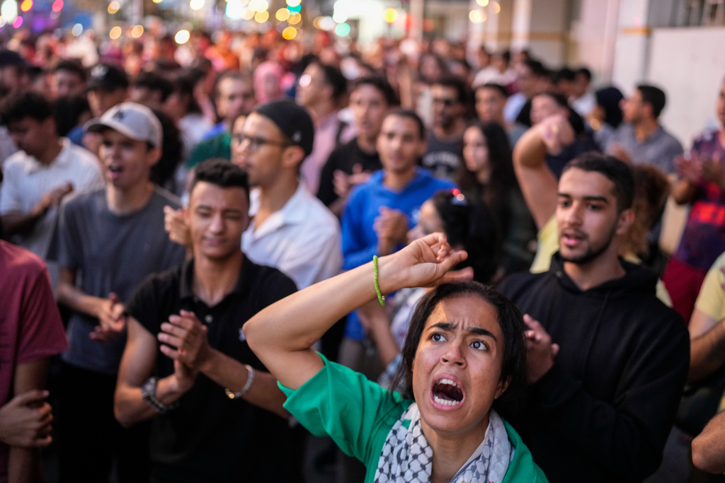 People take part in a protest against corruption and calling for healthcare and education reform, in Rabat, Morocco, Thursday, Oct. 2, 2025. (AP Photo/Mosa'ab Elshamy)