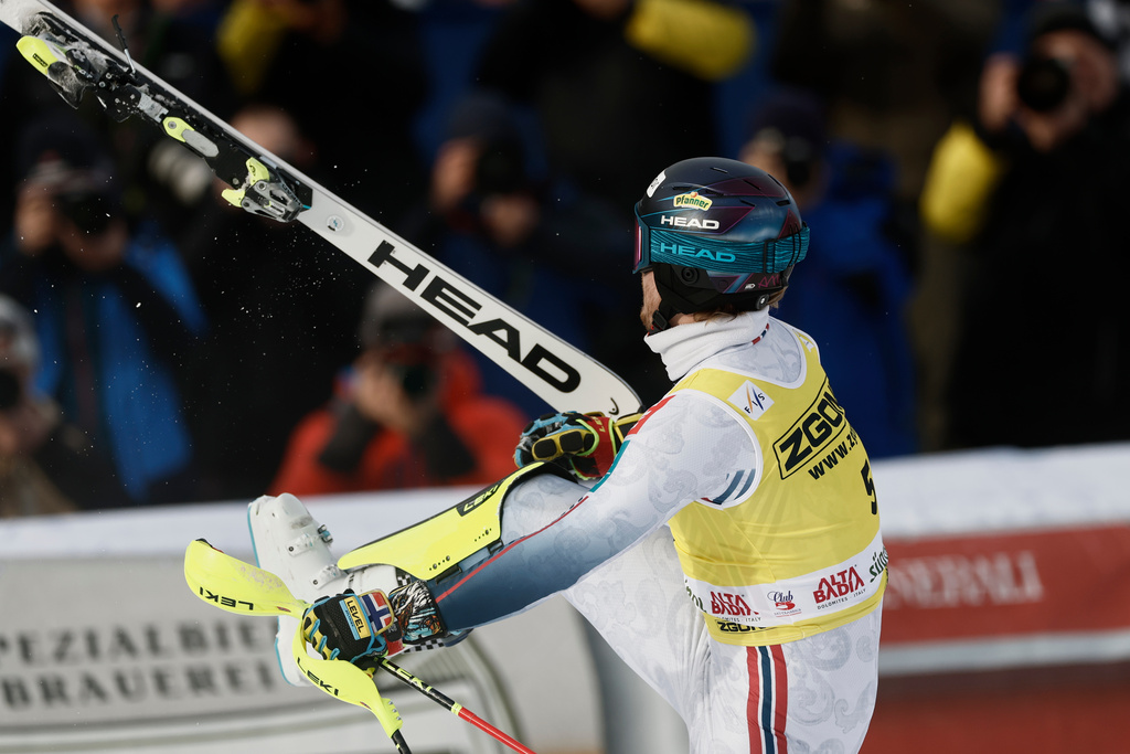 Norway's Atle Lie McGrath celebrates at the finish area of an alpine ski, men's World Cup slalom, in Alta Badia, Italy, Monday, Dec. 22, 2025. (AP Photo/Gabriele Facciotti)