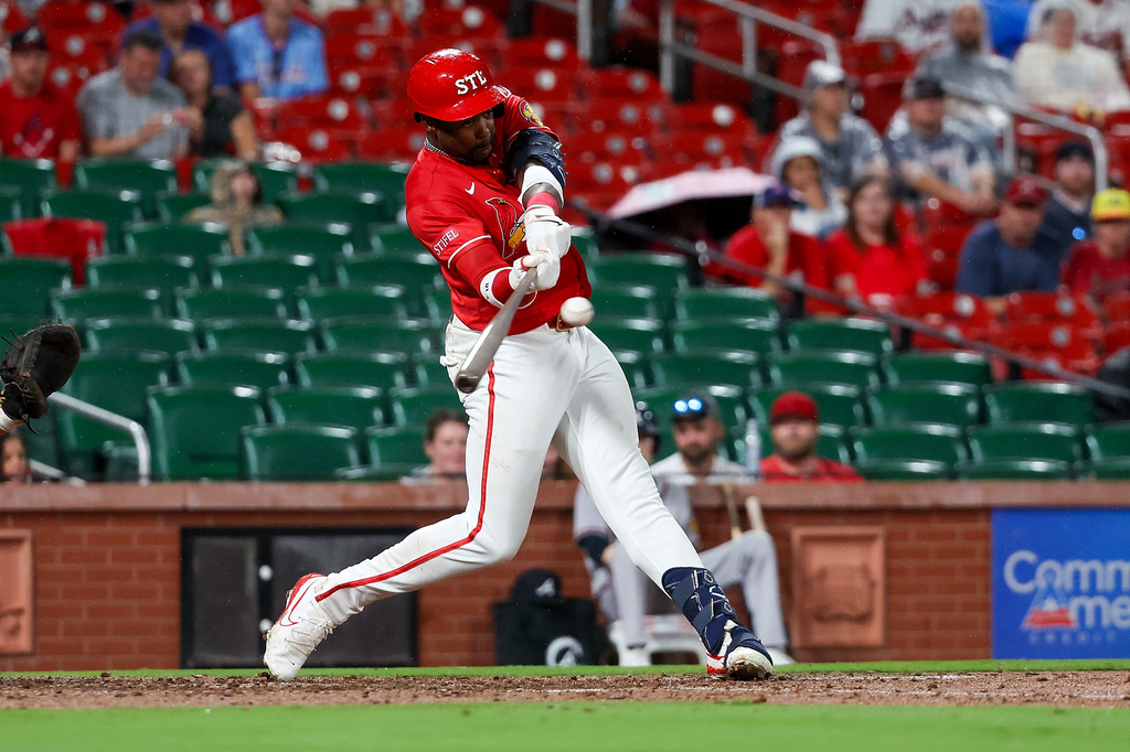 St. Louis Cardinals' Jordan Walker hits an RBI single during the sixth inning against the Atlanta Braves Friday, July 10, 2026, in St. Louis. (AP Photo/Scott Kane)