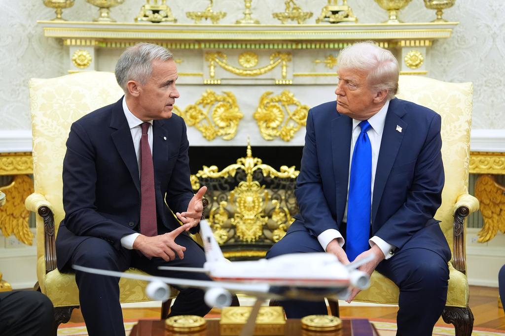 Canadian Prime Minister Mark Carney speaks during a meeting with President Donald Trump at the White House, Tuesday, Oct. 7, 2025, in Washington. (AP Photo/Evan Vucci) Washington. (AP Photo/Evan Vucci)