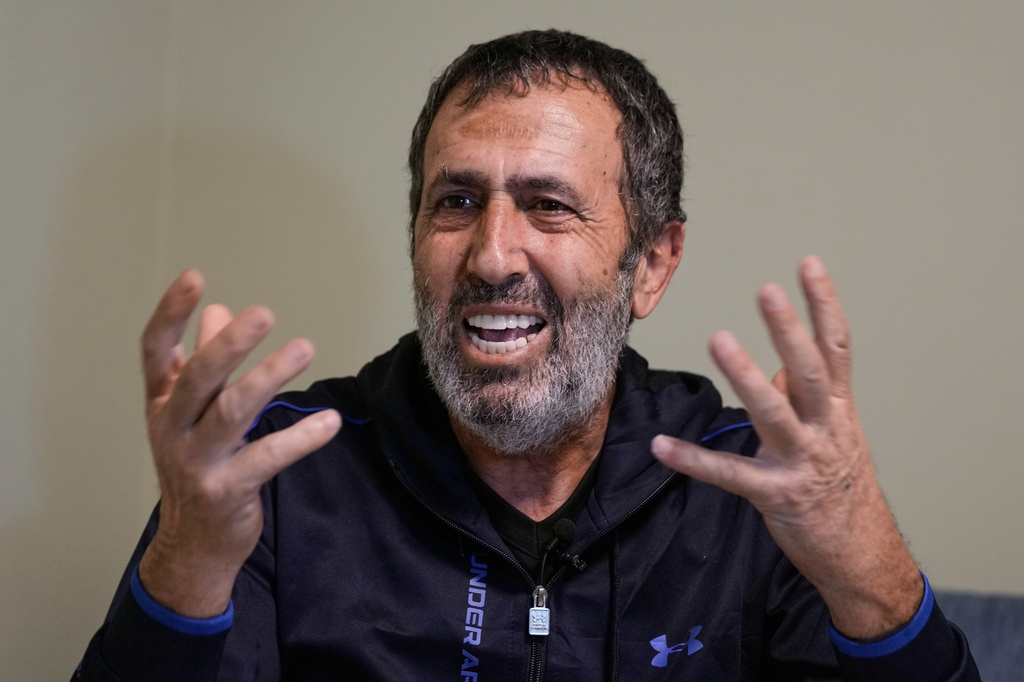 Hassan, the father of Zeinab al-Jabali, 10, who was killed on March 5, 2026, in an Israeli airstrike that hit her house in Libbaya village, east of Lebanon, speaks during an interview at the office of Dr. Ghassan Abu Sitta Fund, in Beirut, Lebanon, Thursday, March 19, 2026. (AP Photo/Bilal Hussein)