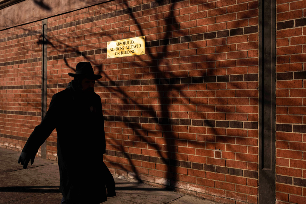 A person walks past the Chabad Lubavitch world headquarters, Thursday, Jan. 29, 2026, in New York. (AP Photo/Yuki Iwamura)