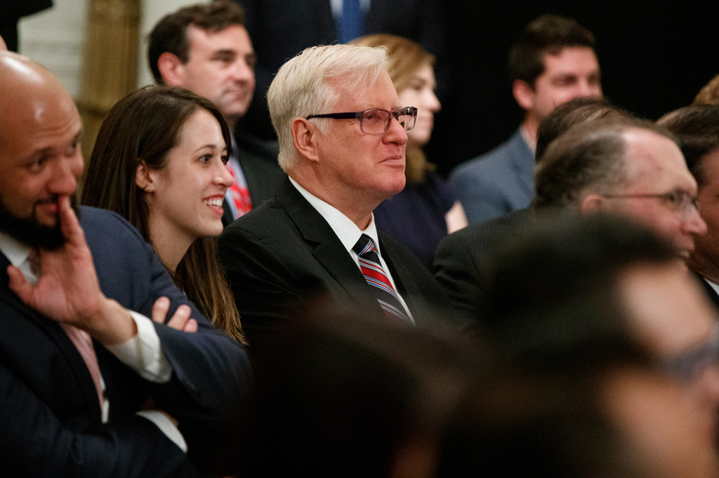 FILE - Jim Hoft, publisher of the Gateway Pundit, listens as President Donald Trump speaks during the "Presidential Social Media Summit" in the East Room of the White House, July 11, 2019, in Washington. (AP Photo/Evan Vucci, File)