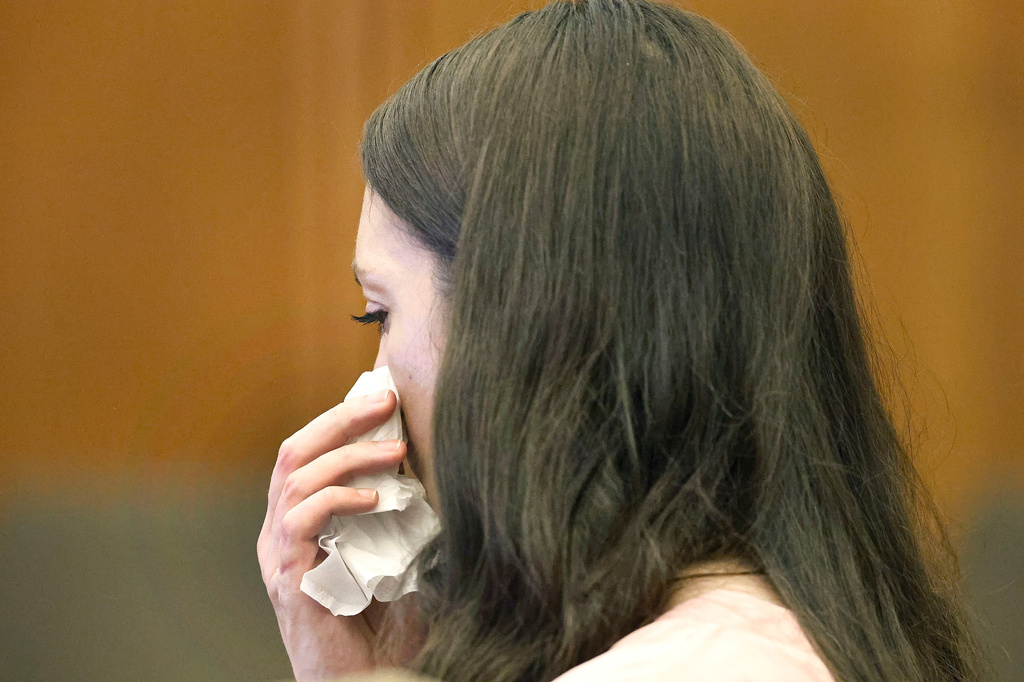 Defendant Lindsay Clancy fights back tears as the details of her children's death are read in court at Plymouth Superior Court in Plymouth, Mass., Monday, July 27, 2026. (Greg Derr/The Patriot Ledger via AP, Pool)