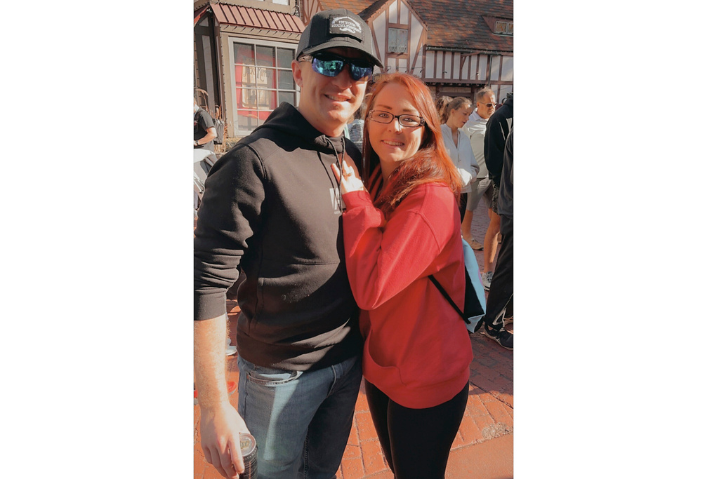 Alicia Belevins and her husband, who is a Marine, shown in an undated photo at Busch Gardens in Williamsburg, Va. (Alicia Blevins via AP)