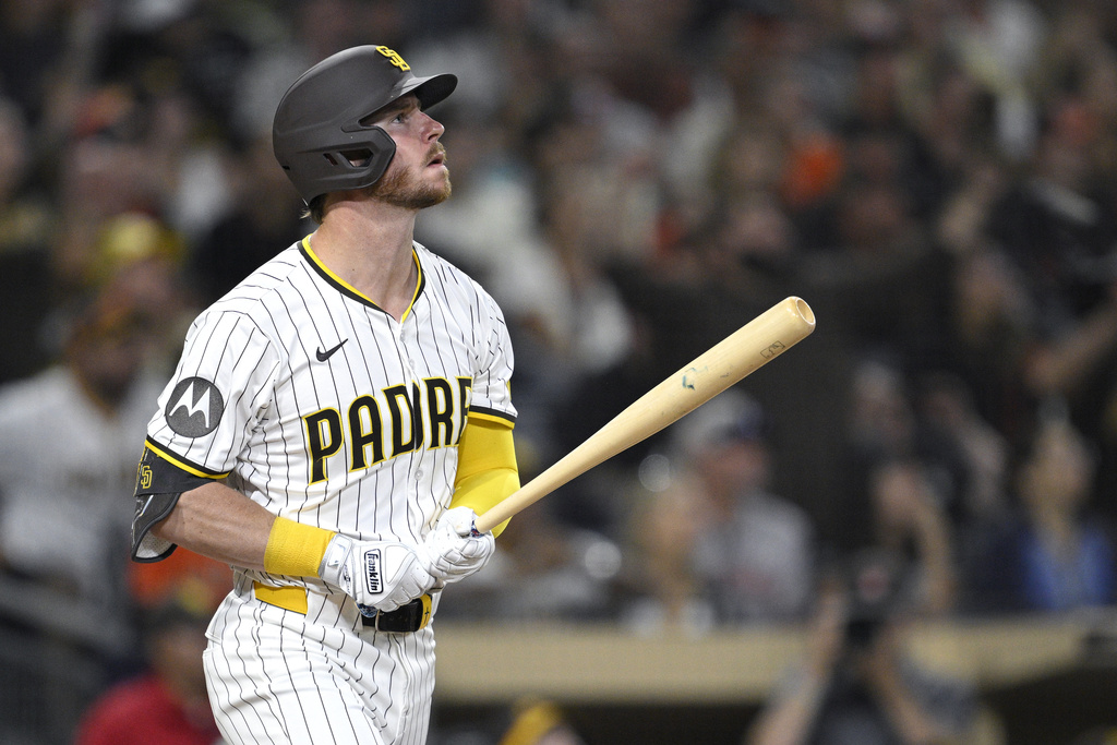 San Diego Padres' Ryan O'Hearn watches his two-run home run against the San Francisco Giants during the seventh inning of a baseball game Monday, Aug 18, 2025, in San Diego. (AP Photo/Orlando Ramirez)