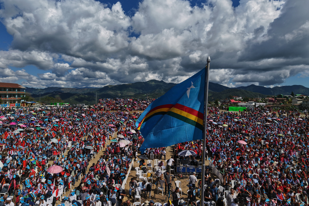 The Naga flag flies, as people wait for the arrival of Thuingaleng Muivah, leader of the National Socialist Council of Nagaland (Isak-Muivah), in Ukhrul, in the northeastern Indian state of Manipur, Wednesday, Oct. 22, 2025. (AP Photo/Anupam Nath)