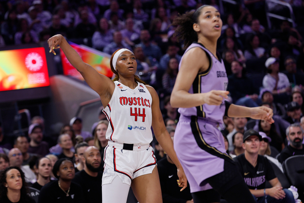Washington Mystics forward Kiki Iriafen (44) scores a 3-point basket against the Golden State Valkyries during the first quarter of a WNBA basketball game in San Francisco, Monday, July 20, 2026. (Santiago Mejia/San Francisco Chronicle via AP)