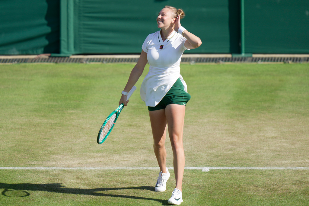 Amanda Anisimova of the United States celebrates her victory against Sofia Kenin of the United States in their second round women's singles match at the Wimbledon Tennis Championships in London, Thursday, July 2, 2026. (AP Photo/Brian Inganga)