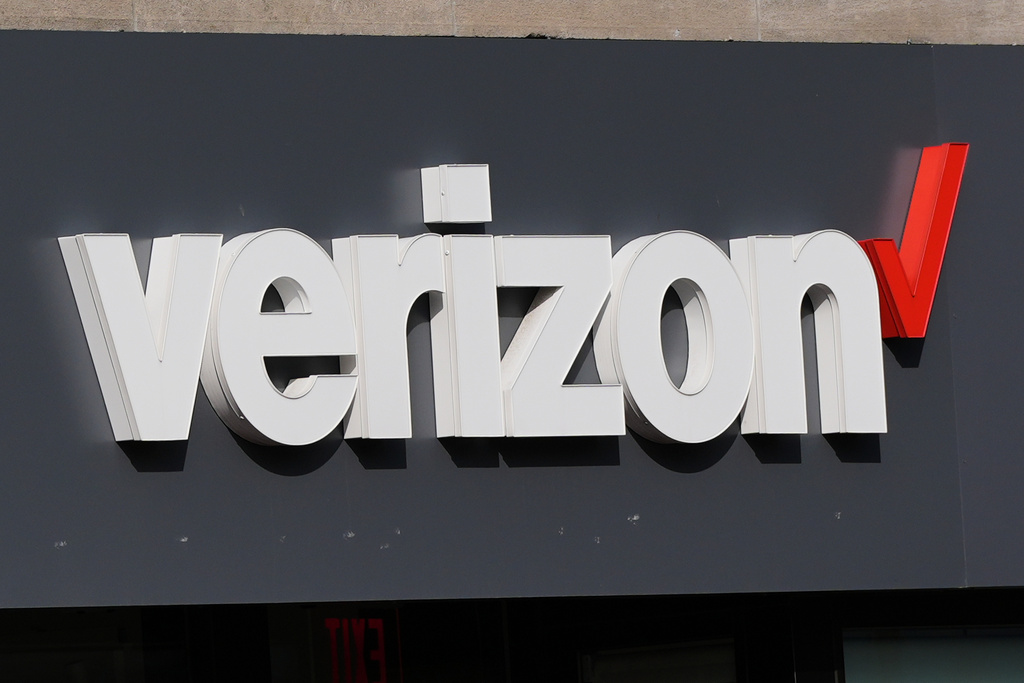 FILE - A Verizon sign is displayed on a store, Sept. 30, 2025, in Cambridge, Mass. (AP Photo/Charles Krupa, file)