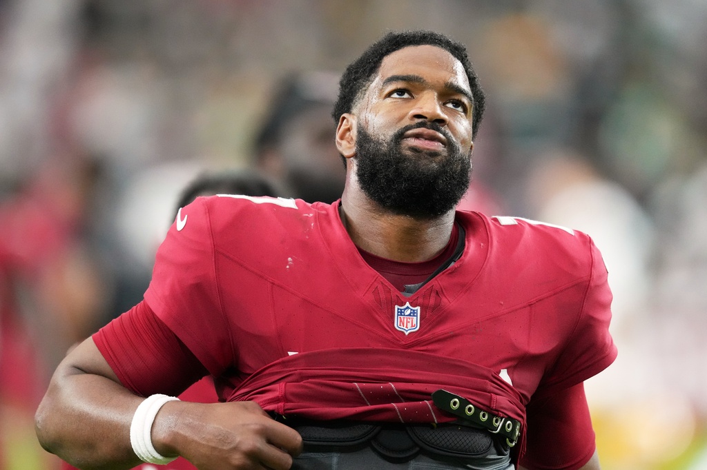 Arizona Cardinals' Jacoby Brissett walks off the field after an NFL football game against the Green Bay Packers Sunday, Oct. 19, 2025, in Glendale, Ariz. (AP Photo/Ross D. Franklin)