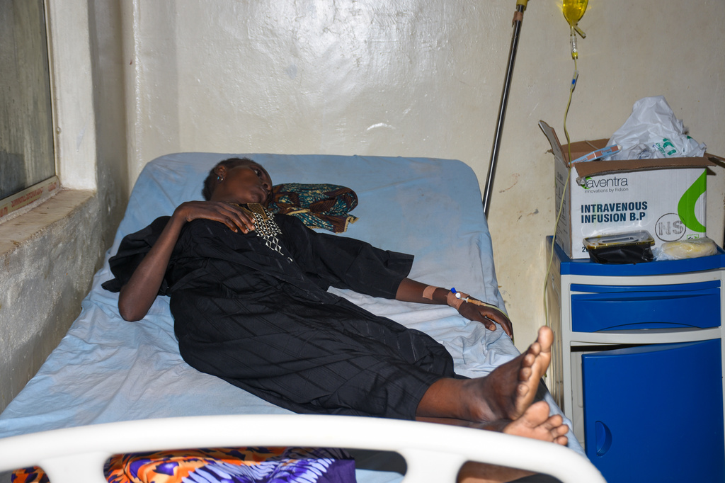 A woman who was rescued after being held in a forest after being abducted from the Woro community by gunmen in February receives medical attention at a hospital in Ilorin, Nigeria, Friday, Aug. 7, 2026. (AP Photo/Abubakar Khadijat)
