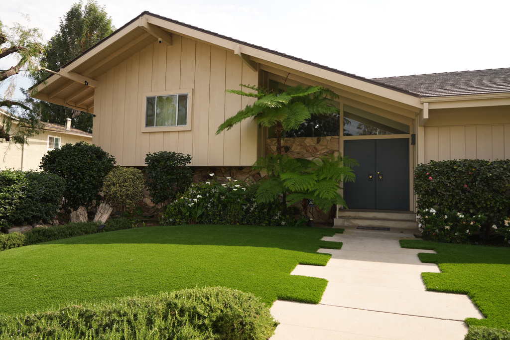 The Brady Bunch House, the two-story single-family home that served as the main setting for the television series "The Brady Bunch" in the Studio City neighborhood of Los Angeles, Wednesday, March 4, 2026, is now designated as a Los Angeles Historic-Cultural Monument. (AP Photo/Damian Dovarganes)