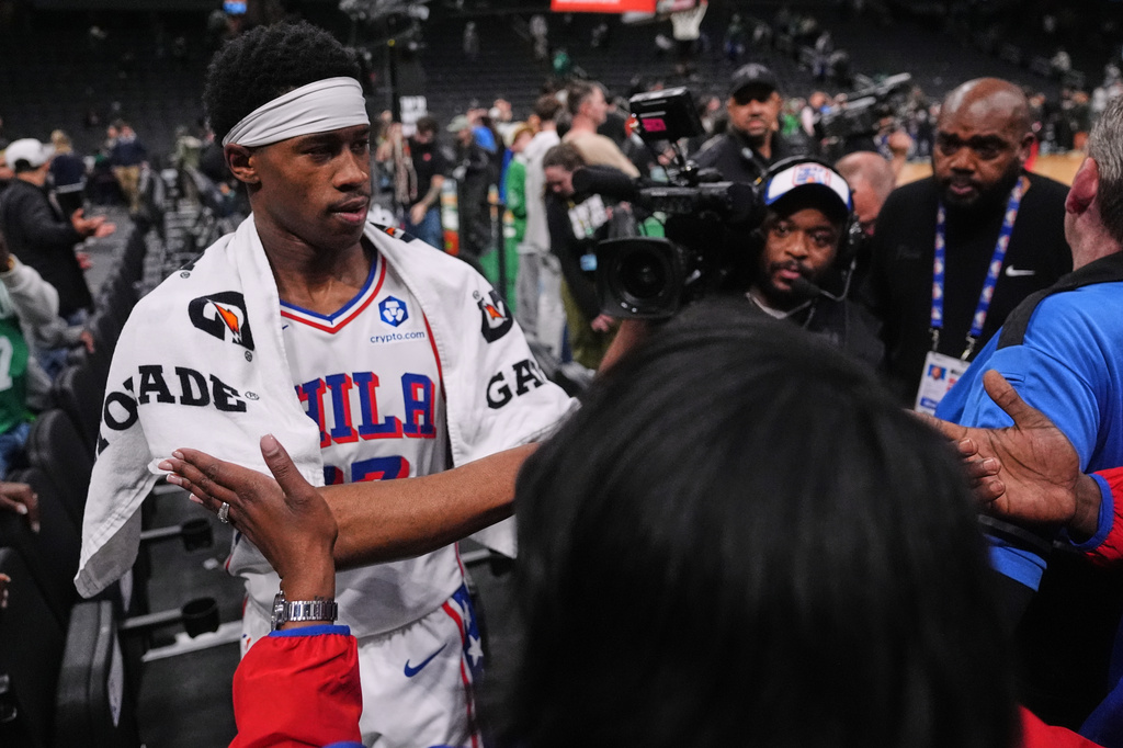 Philadelphia 76ers guard Vj Edgecombe is congratulated by fans after defeating the Boston Celtics following Game 2 of a first-round NBA playoffs basketball series, Tuesday, April 21, 2026, in Boston. (AP Photo/Charles Krupa)