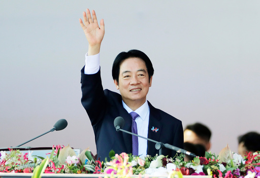 Taiwanese President Lai Ching-te waves during National Day celebrations in front of the Presidential Building in Taipei, Taiwan, Friday, Oct. 10, 2025. (AP Photo/Chiang Ying-ying) Taiwanese President Lai Ching-te waves during National Day celebrations in front of the Presidential Building in Taipei, Taiwan, Friday, Oct. 10, 2025. (AP Photo/Chiang Ying-ying)