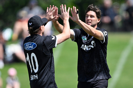 New Zealand bowler Zak Foulkes, right, celebrates after taking the wicket of England batsman Ben Duckett during the One Day international cricket match between New Zealand and England in Mt Maunganui, New Zealand, Sunday, Oct.26, 2025. (Andrew Cornaga/Photosport via AP) New Zealand bowler Zak Foulkes, right, celebrates after taking the wicket of England batsman Ben Duckett during the One Day international cricket match between New Zealand and England in Mt Maunganui, New Zealand, Sunday, Oct.26, 2025. (Andrew Cornaga/Photosport via AP)