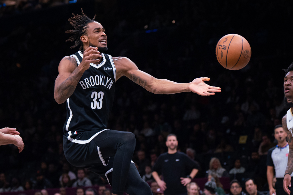 Brooklyn Nets center Nic Claxton loses control of the ball during the first half of an NBA basketball game against the New Orleans Pelicans, Saturday, Dec. 6, 2025, in New York. (AP Photo/Angelina Katsanis)