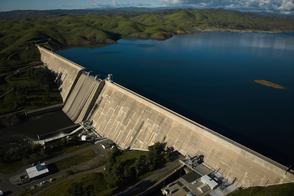 FILE - An aerial view shows Friant Dam which holds back Millerton Lake in Friant, Calif., Friday, March 7, 2025. (AP Photo/Jae C. Hong, File)