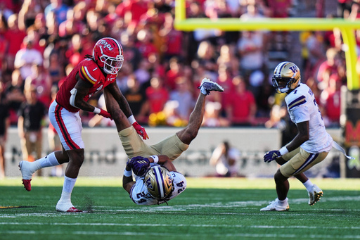 Washington safety Makell Esteen (24) intercepts a pass intended for Maryland wide receiver Jalil Farooq (1) during the first half of an NCAA college football game, Saturday, Oct. 4, 2025, in College Park, Md. (AP Photo/Stephanie Scarbrough) Washington safety Makell Esteen (24) intercepts a pass intended for Maryland wide receiver Jalil Farooq (1) during the first half of an NCAA college football game, Saturday, Oct. 4, 2025, in College Park, Md. (AP Photo/Stephanie Scarbrough)