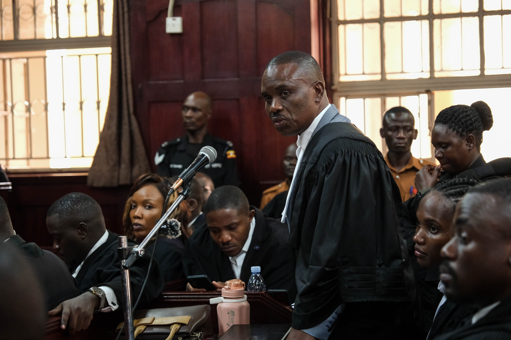 Erias Lukwago, lawyer for Uganda's veteran opposition leader Kizza Besigye, speaks during a court session on a ruling on Besigye's bail application at the High Court in Kampala, Uganda, Monday, Dec. 29, 2025. (AP Photo/Hajarah Nalwadda)