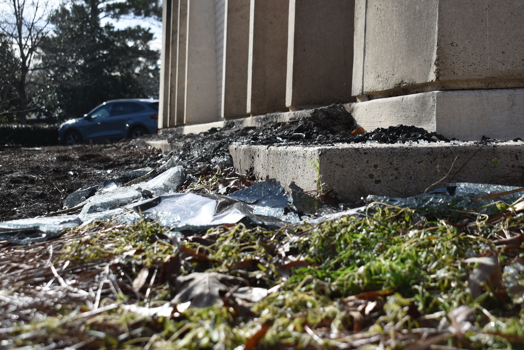 Burnt debris from a fire at the Beth Israel Congregation glint in the sun on Monday, Jan. 12, 2026, in Jackson, Miss. (AP Photo/Sophie Bates)