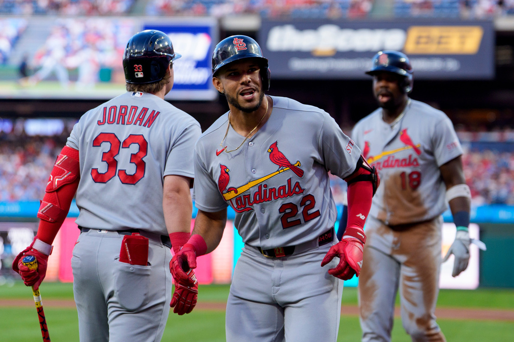 St. Louis Cardinals' Joshua Baez, center, celebrates after his two-run home run with Blaze Jordan, left, during the first inning of a baseball game against the Philadelphia Phillies, Friday, Aug. 21, 2026, in Philadelphia. (AP Photo/Chris Szagola)