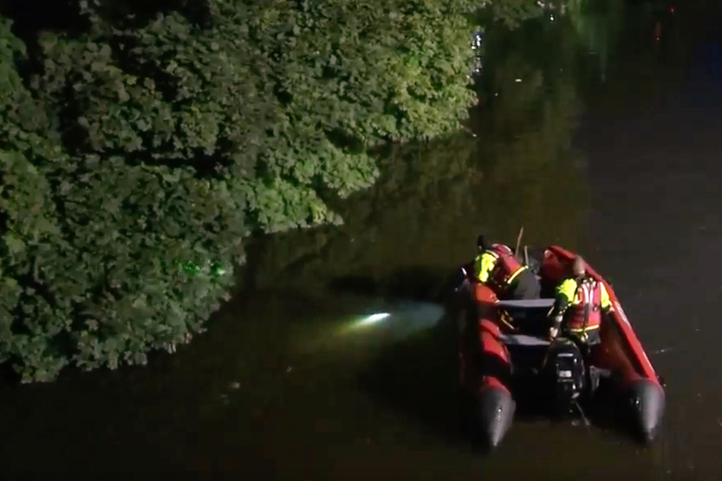 In this image taken from WABC-TV video, first responders search for missing children in the Passaic River, Wednesday, July 29, 2026, near Passaic, N.J. (WABC-TV via AP)