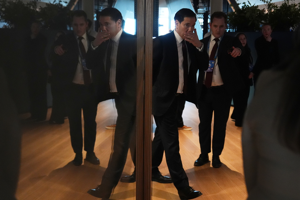 United States Secretary of State Marco Rubio is reflected in a glass as he arrives for a meeting with Turkish Foreign Minister Hakan Fidan on the sidelines of a meeting of NATO foreign ministers in Helsingborg, Sweden, Friday, May 22, 2026. (AP Photo/Julia Demaree Nikhinson, Pool)