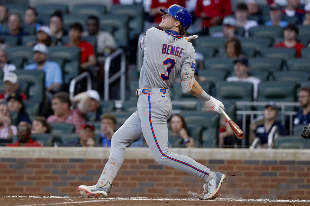New York Mets' Carson Benge follows through on a solo home run against the Atlanta Braves during the second inning of a baseball game, Monday, July 6, 2026, in Atlanta. (AP Photo/Erik S. Lesser)