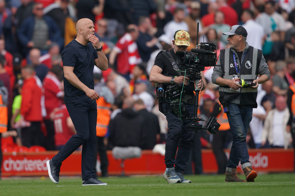 Liverpool's manager Arne Slot walks off the pitch after the Premier League soccer match between Liverpool and Chelsea in Liverpool, England, Saturday, May 9, 2026. (AP Photo/Ian Hodgson)