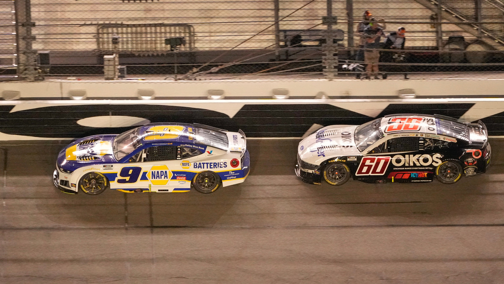 Chase Elliott (9) leads Ryan Preece (60) through the front stretch at the half way point of a NASCAR Cup Series auto race at Daytona International Speedway, Saturday, Aug. 29, 2026, in Daytona Beach, Fla. (AP Photo/John Raoux)