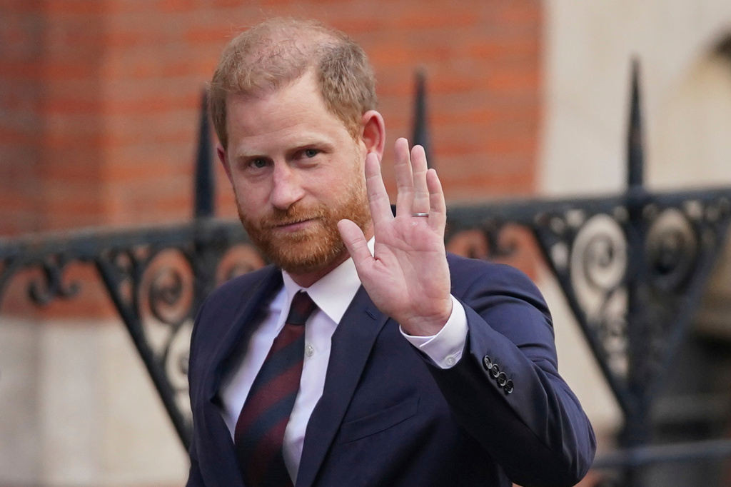 FILE - Prince Harry waves as he leaves the Royal Courts of Justice in London, Wednesday, April 9, 2025. (AP Photo/Alberto Pezzali, File)