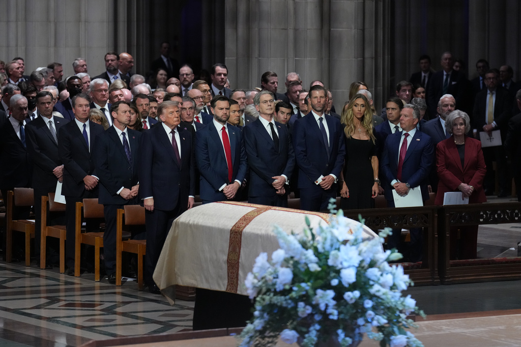 President Donald Trump, Vice President JD Vance and other guests, attend the funeral of Sen. Lindsey Graham, R-S.C., Tuesday July 28, 2026, at the Washington National Cathedral in Washington. (AP Photo/Jacquelyn Martin)