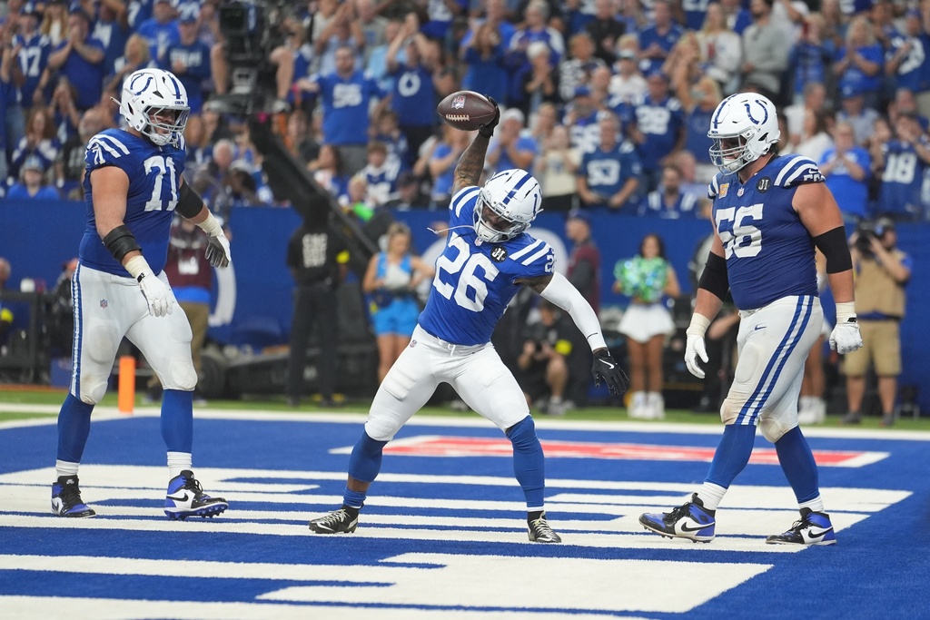 Indianapolis Colts running back Ameer Abdullah (26) celebrates a touchdown run during the second half of an NFL football game against the Las Vegas Raiders, Sunday, Oct. 5, 2025, in Indianapolis. (AP Photo/Michael Conroy)