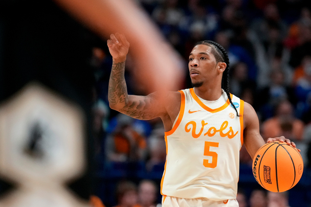 FILE - Tennessee guard Zakai Zeigler moves the ball against Wofford during the first half in the first round of the NCAA college basketball tournament, March 20, 2025, in Lexington, Ky. (AP Photo/Brynn Anderson, File)