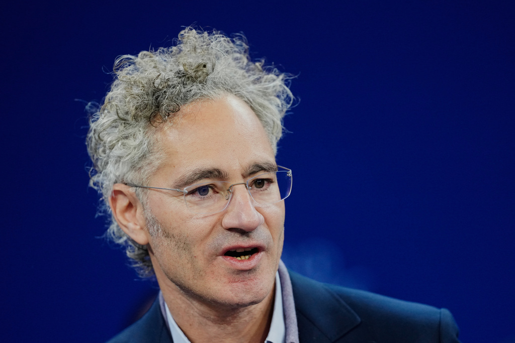 Alex Karp, CEO of the software firm Palantir Technologies speaks during the Annual Meeting of the World Economic Forum in Davos, Switzerland, Tuesday, Jan. 20, 2026. (AP Photo/Markus Schreiber)