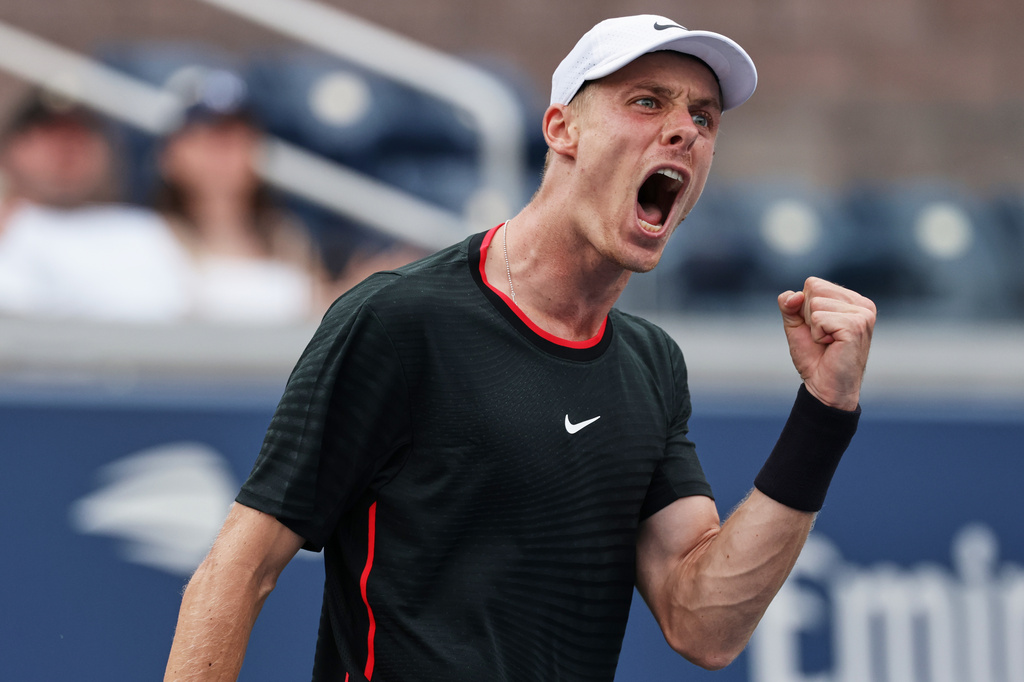 Denis Shapovalov, of Canada, reacts during a match against Miomir Kecmanovic, of Serbia, during the first round of the U.S. Open tennis championships, Sunday, Aug. 30, 2026, in New York. (AP Photo/Adam Hunger)