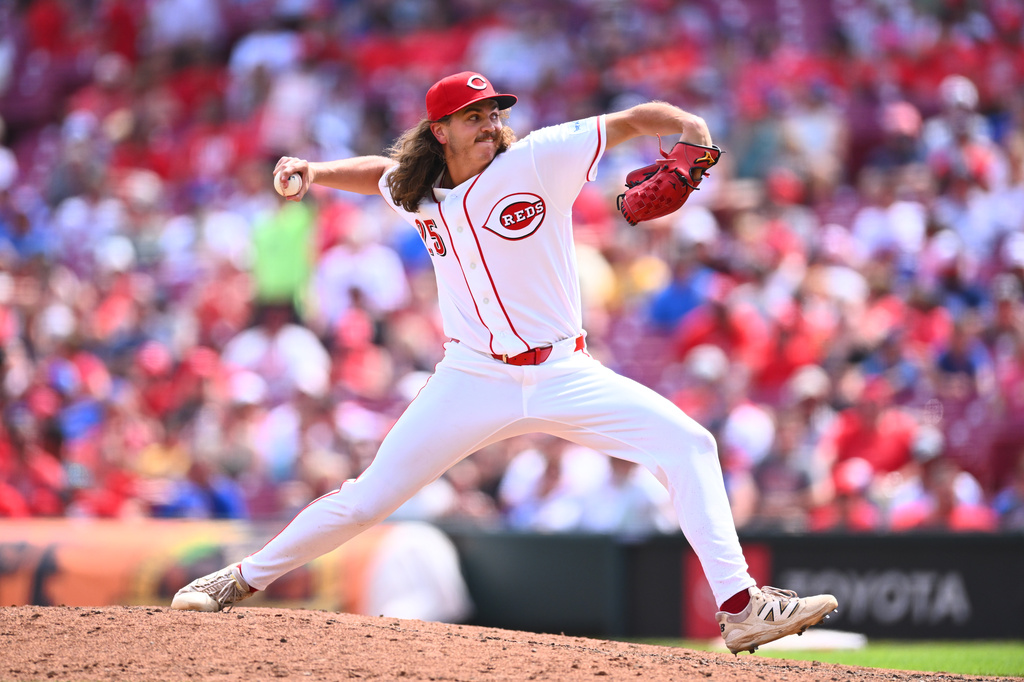 Cincinnati Reds pitcher Rhett Lowder throws during the eighth inning of a baseball game against the Chicago Cubs in Cincinnati, Sunday, July 12, 2026. (AP Photo/Ben Jackson)