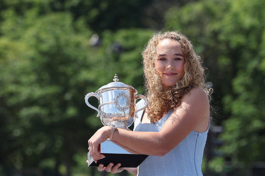 Russia's Mirra Andreeva poses with her Trophy a day after winning the Roland Garros French Open tennis tournament, in Paris, Sunday June 7, 2026. (Xavier Galiana, Pool Photo via AP)