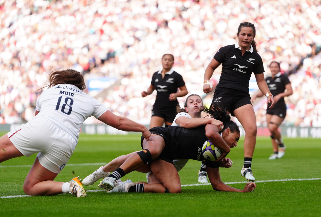 New Zealand's Mererangi Paul scores a try during the WXV Global Series match between England and New Zealand in London, Saturday Sept. 26, 2026. (David Davies/PA via AP)