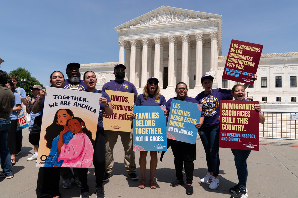 Activists celebrate the Supreme Court's birthright citizenship ruling outside of the Supreme Court on Capitol Hill, Tuesday, June 30, 2026, in Washington. (AP Photo/Jose Luis Magana)