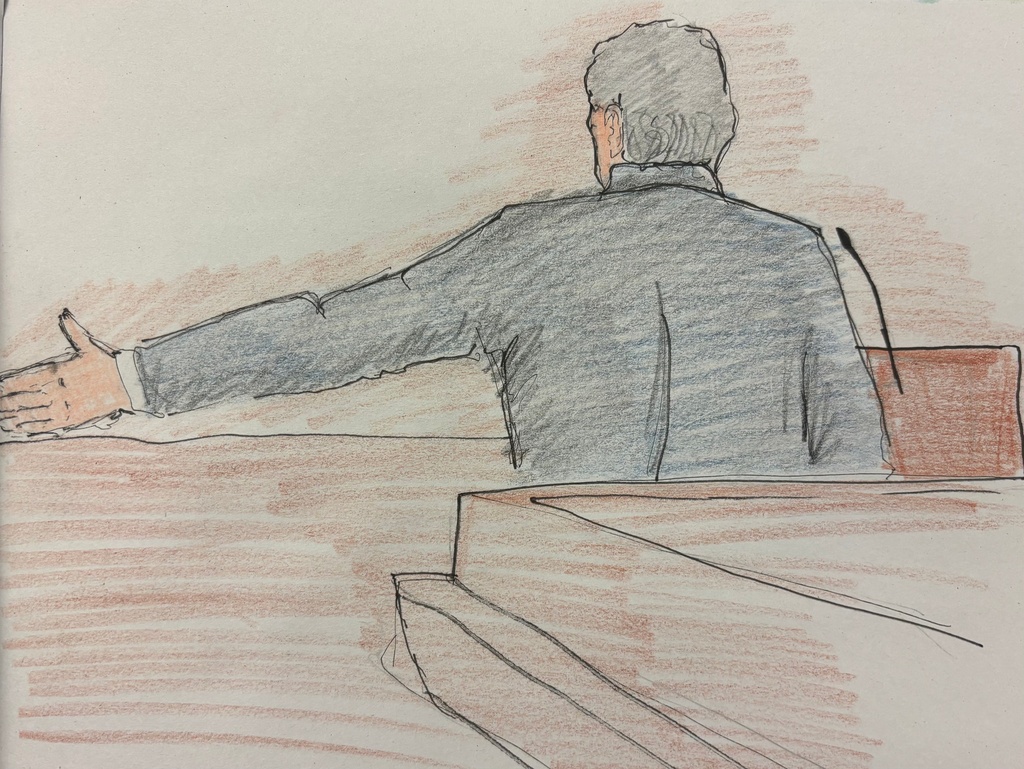 This courtroom sketch depicts the defense attorney giving their closing argument to the jury at Milwaukee County Circuit Judge Hannah Dugan's trial in court, Thursday, Dec. 18, 2025 in Milwaukee, Wis. (Adela Tesnow via AP, Pool)