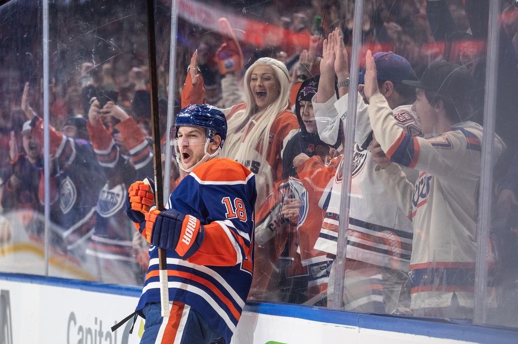 Edmonton Oilers' Zach Hyman (18) celebrates a goal against the San Jose Sharks during overtime of an NHL hockey game, in Edmonton, Alberta, Thursday, Jan. 29, 2026. (Jason Franson/The Canadian Press via AP)