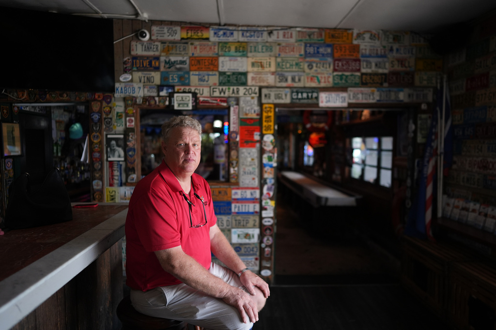 Bobby Kuchinsky, general manager of Half Shell Raw Bar, poses for a portrait inside his restaurant, Saturday, July 25, 2026, in Key West, Fla. (AP Photo/Rebecca Blackwell)